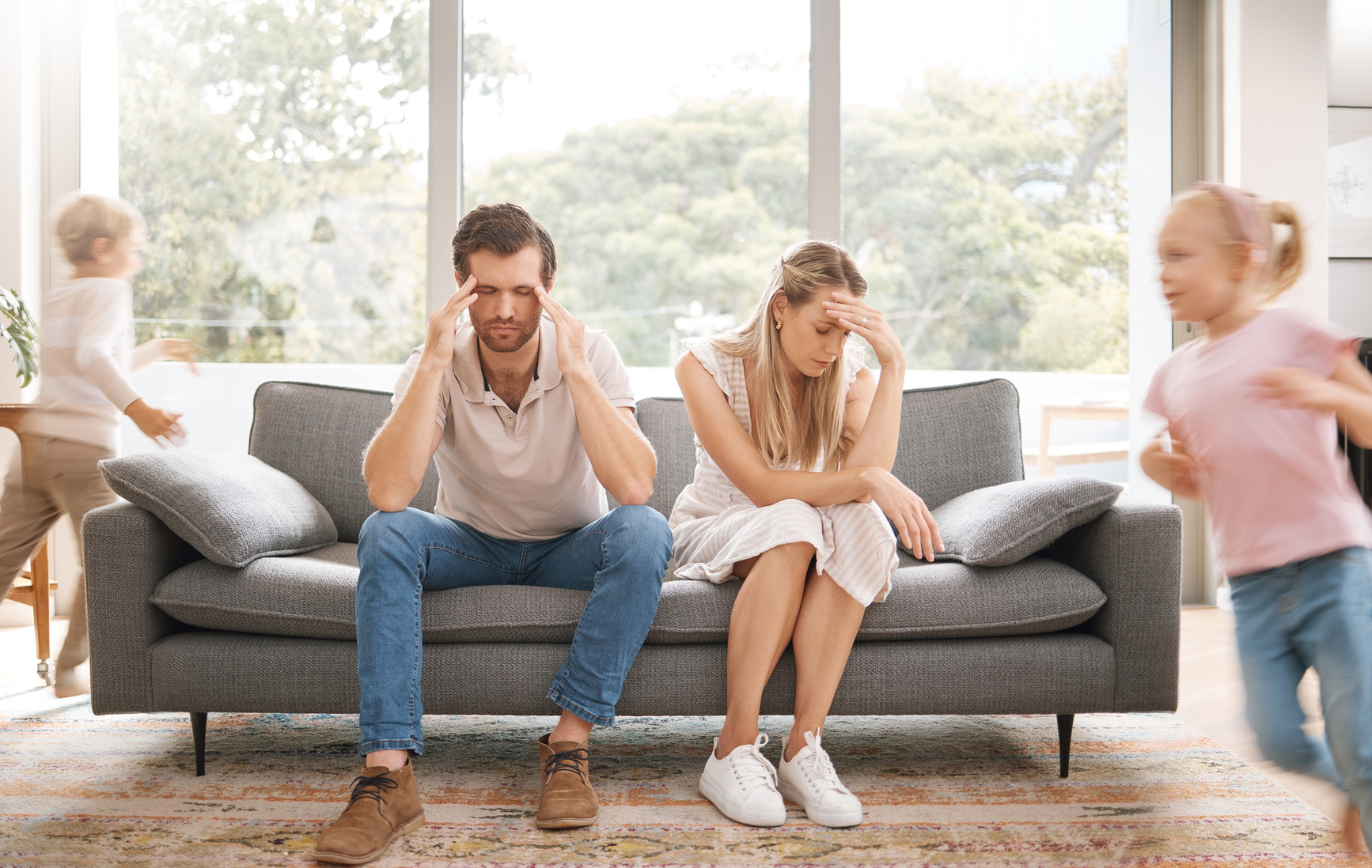 Noise, Headache and Stress with Children and Parents in a Living Room, Overwhelmed by  Kids Energy. Burnout, Anxiety and  in Crisis, Suffering from Behaviour Problem and Fatigue