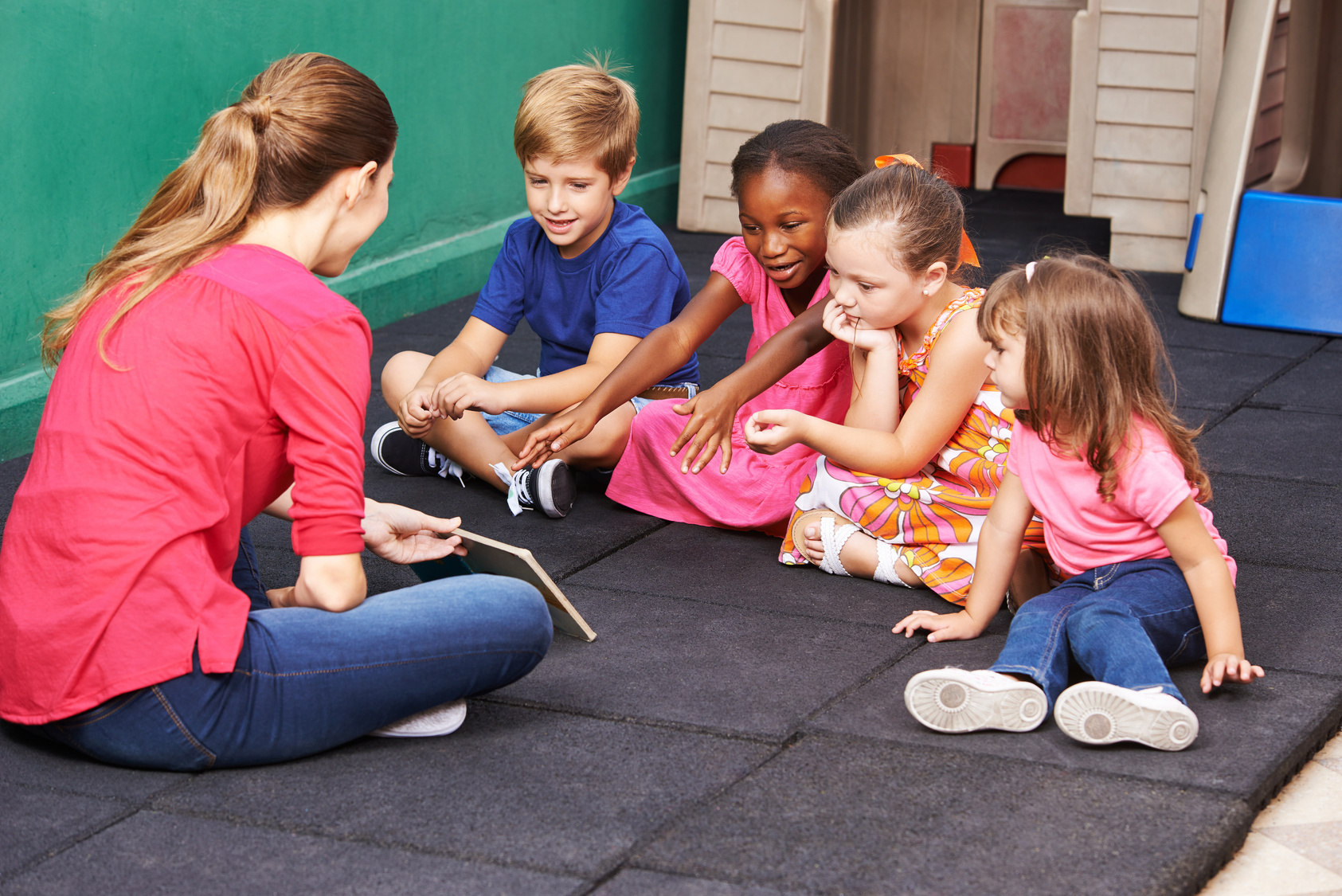 Group of Kids Talking about Book  